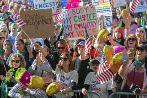 Women protest against Trump's presidency.