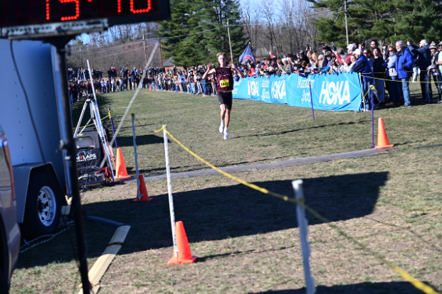 Graffeo celebrates as he crosses the finish line at the XC State Championships. 