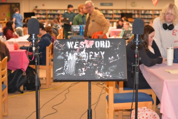 As students settle into the library, microphones are prepared for the first Listening Lunch of the year. 