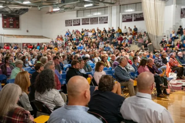 Westford Academy's gym is full for the special town meeting where Article 10 was passed.