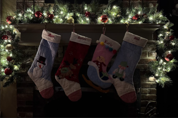 Stockings hung from the fireplace mantel. 