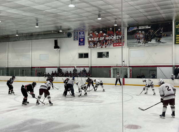 The players assume their positions as they start to play against North Andover. 