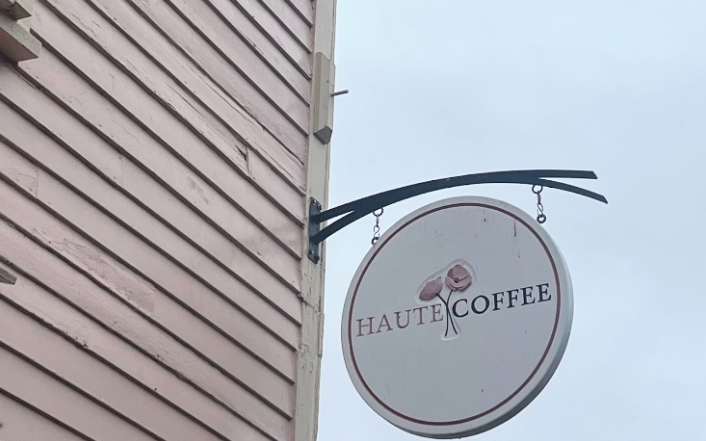 A sign displaying Haute Coffee.