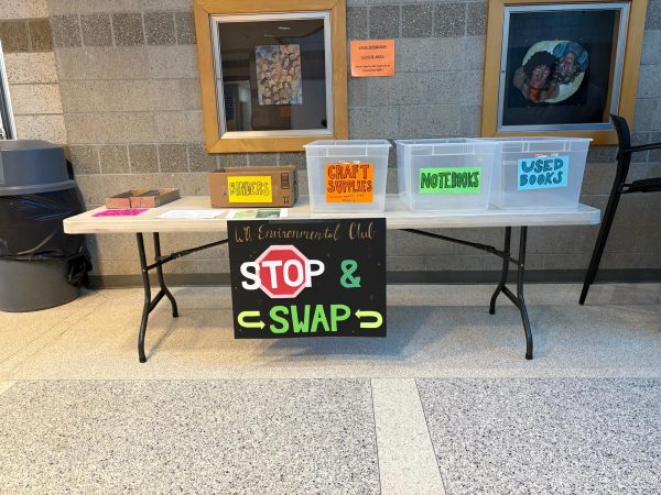 The swap shop table set up in the flag lobby