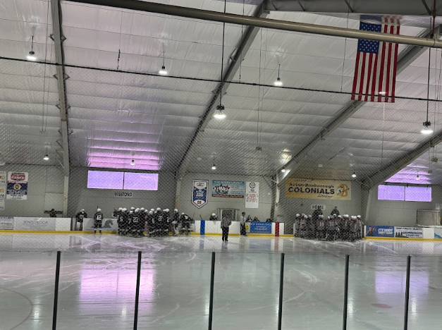 WA and HPNA huddle up with their coaches before getting back onto the ice for the second period. 