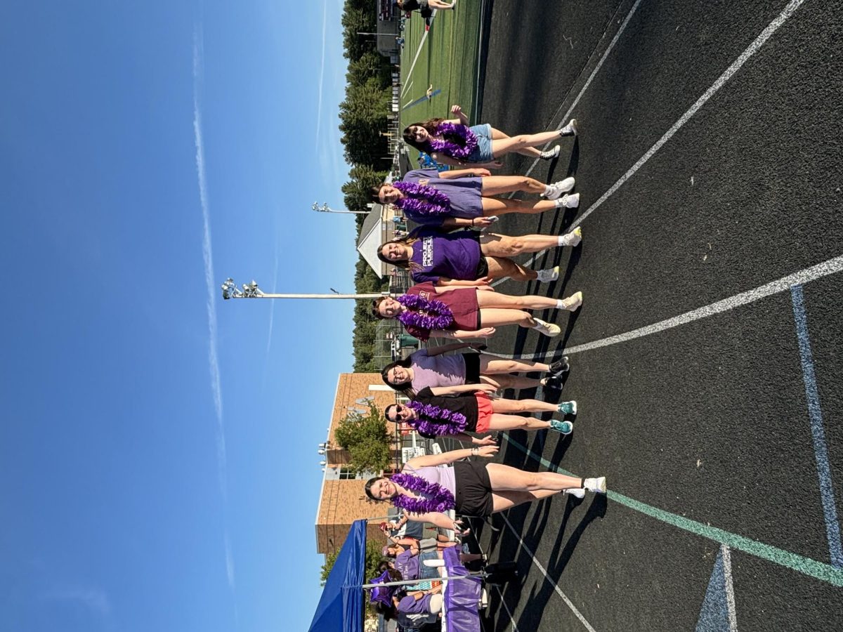 A team of girls walks around the track to show their support.
(picture provided by Everett)