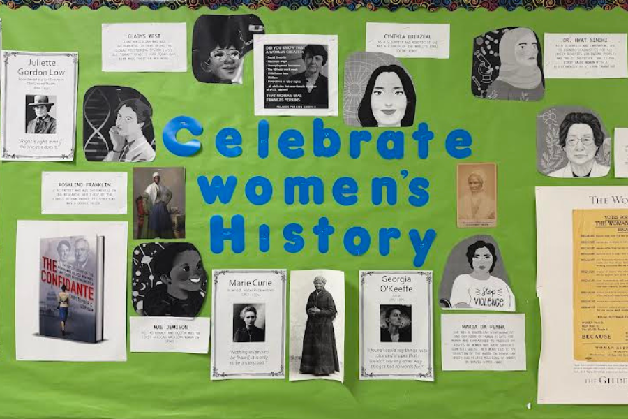 A bulletin board celebrating women's history in the WA history hallway.