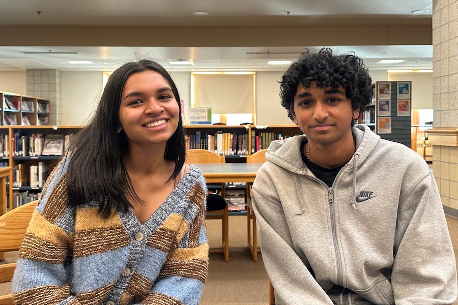 Chatiwala and Navuduri pose for a photo in the WA library.