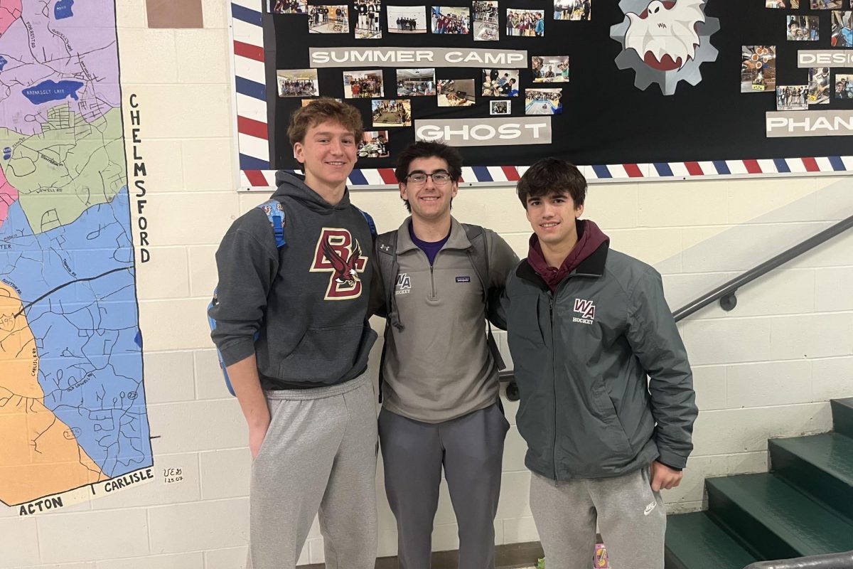 From left to right: senior captain Peter Burns, junior captain Nick Kane, and senior assistant captain Cam Hoagland smile for a photo.