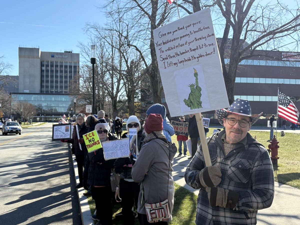 A group of Westford residents protest outside ICE facility in Burlington.