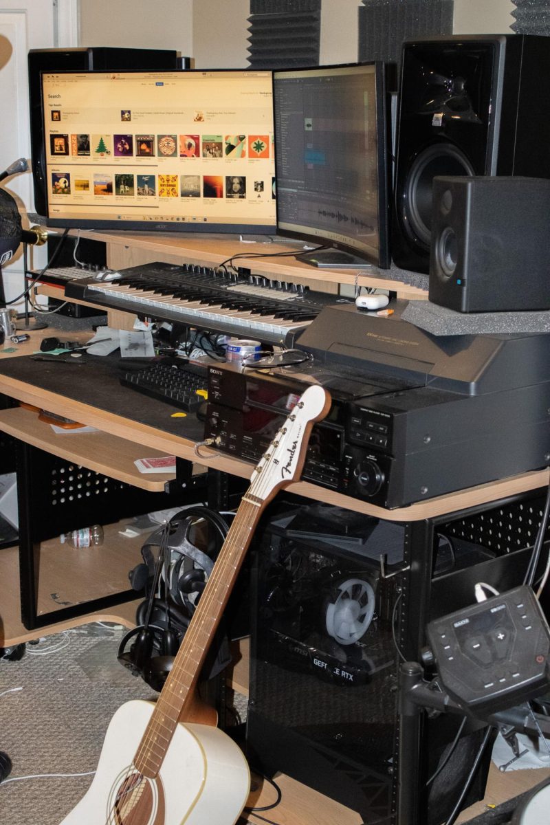 Clark's home studio is nestled in the basement and features a variety of speakers, monitors, and instruments.