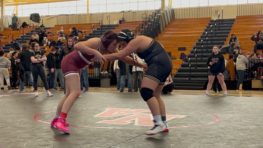Bernier wrestles in a match. 