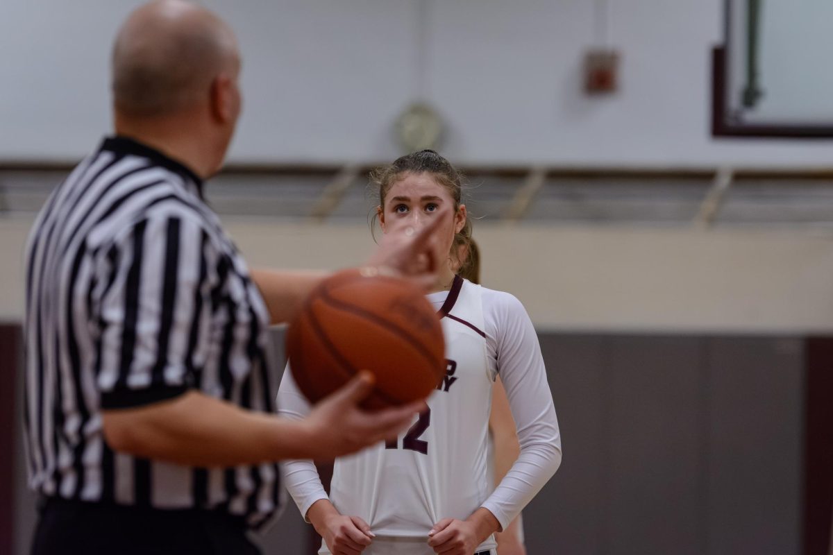 Sophomore Grace Trahan eyes the hoop before she attempts a free throw.