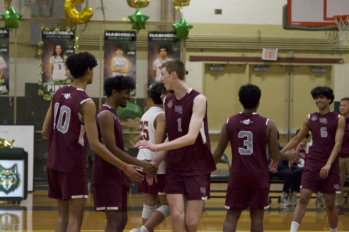 The Ghosts' congratulate their team after securing their win against the opposing team.