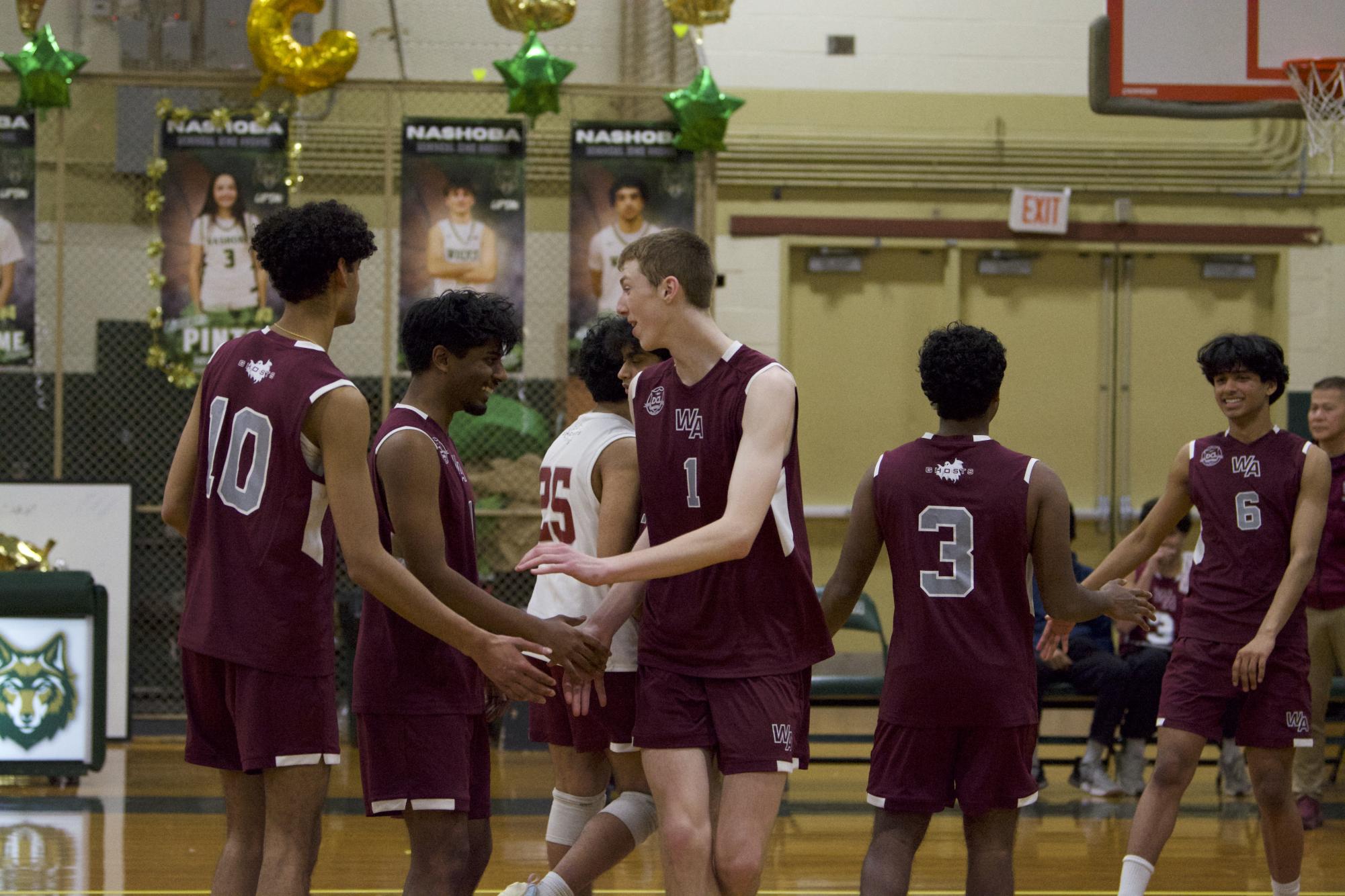 The Ghosts' congratulate their team after securing their win against the opposing team.