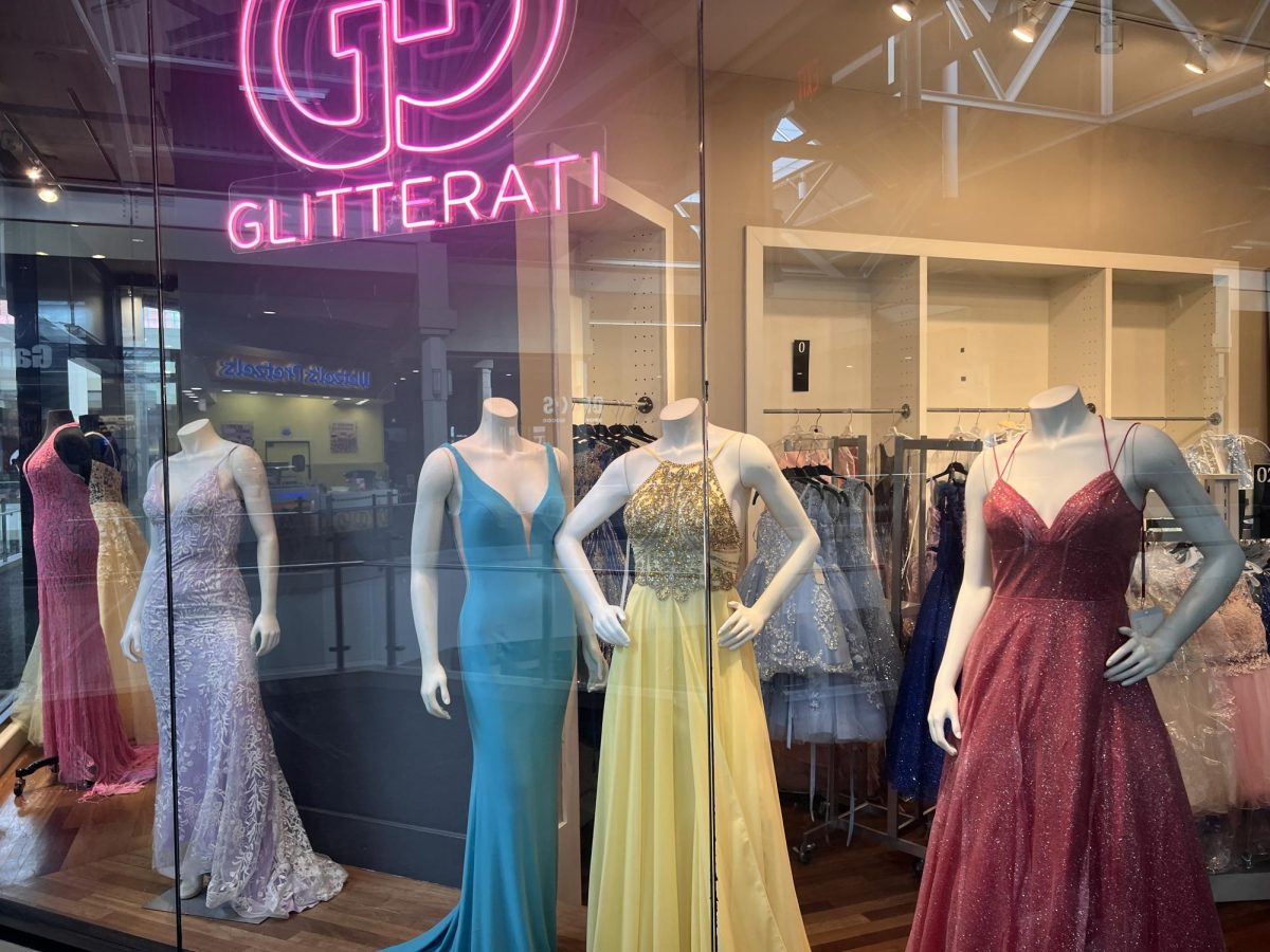 Prom dress store displaying dresses in the Pheasant Lane mall.
