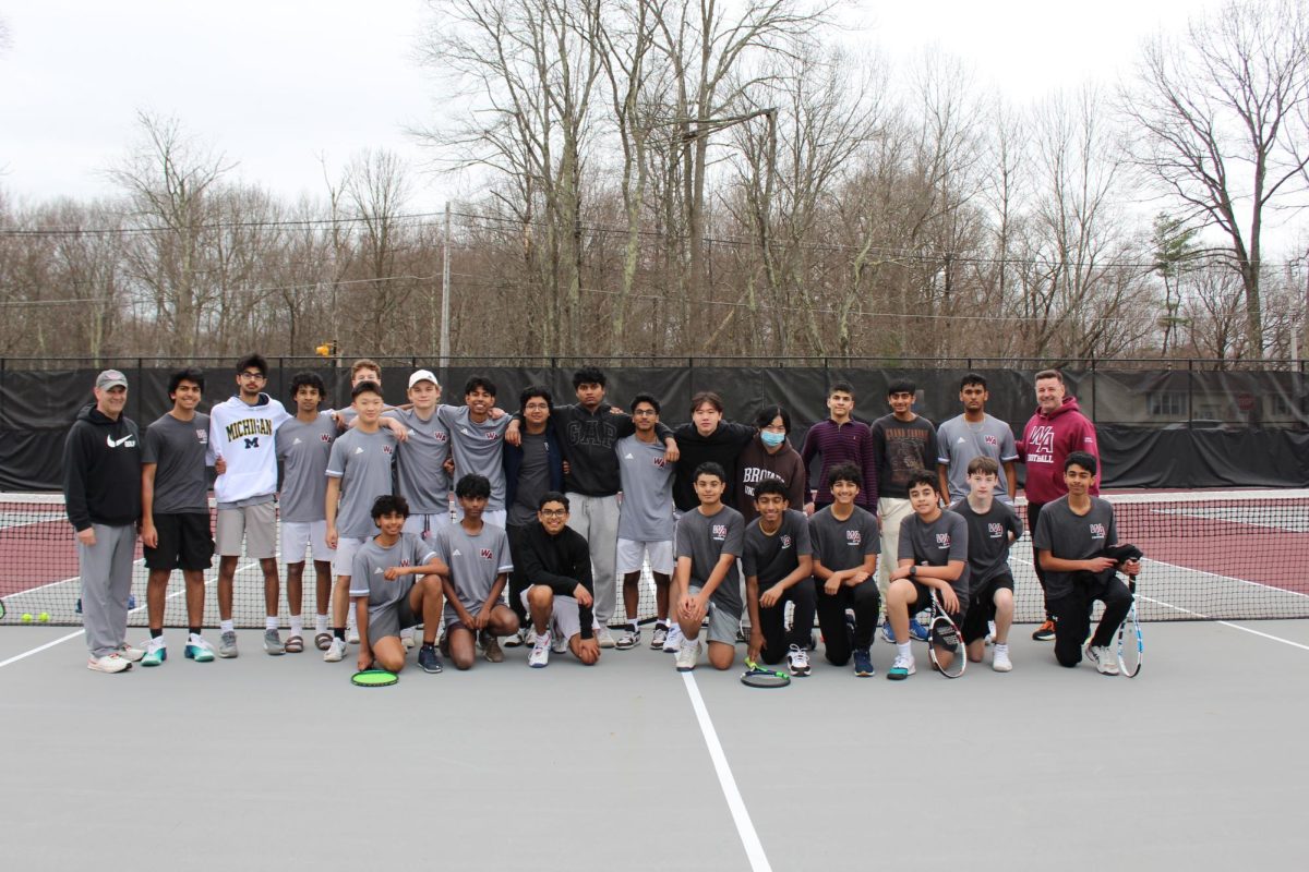 WA Boys' Tennis poses for a team photo after their win against North Andover High School. 