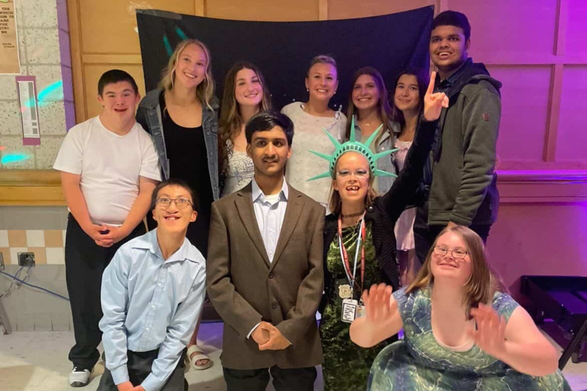 The Buddies and Club members gather for a photo at last year's prom.